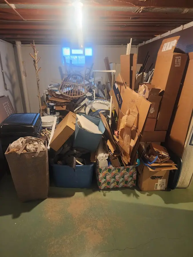 Roll-off dumpster container at job site for 2 Yard Dumpster Rental in Claymont